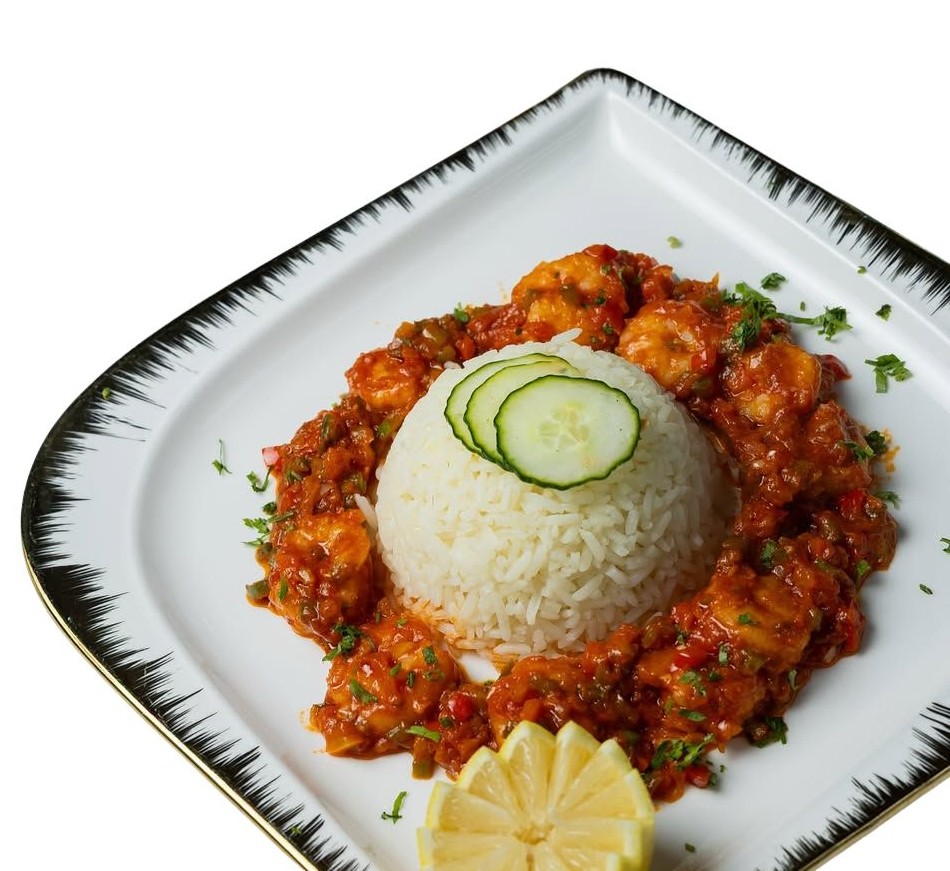 Succulent shrimp sautéed in aromatic sauce served over fluffy rice